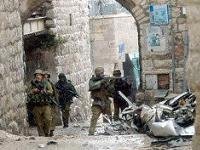 Israeli soldiers invade a Palestinian city.